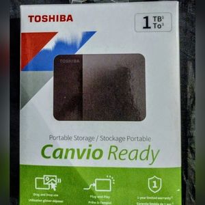 Toshiba Canvio 1TB plug and Play portable Hard drive.